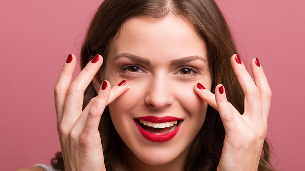 girl posing with eyelash extensions
