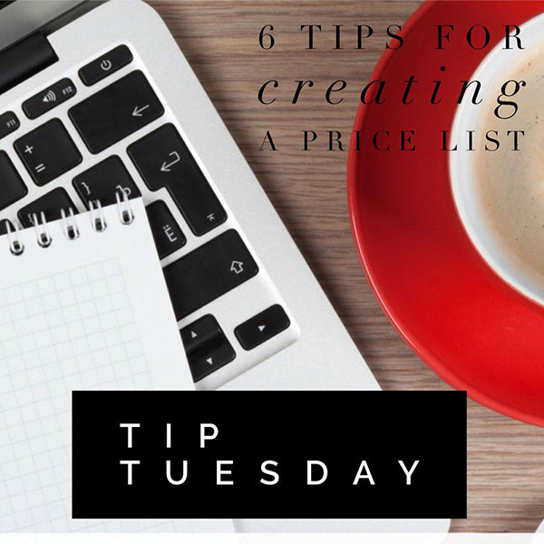 a laptop and notebook on a table